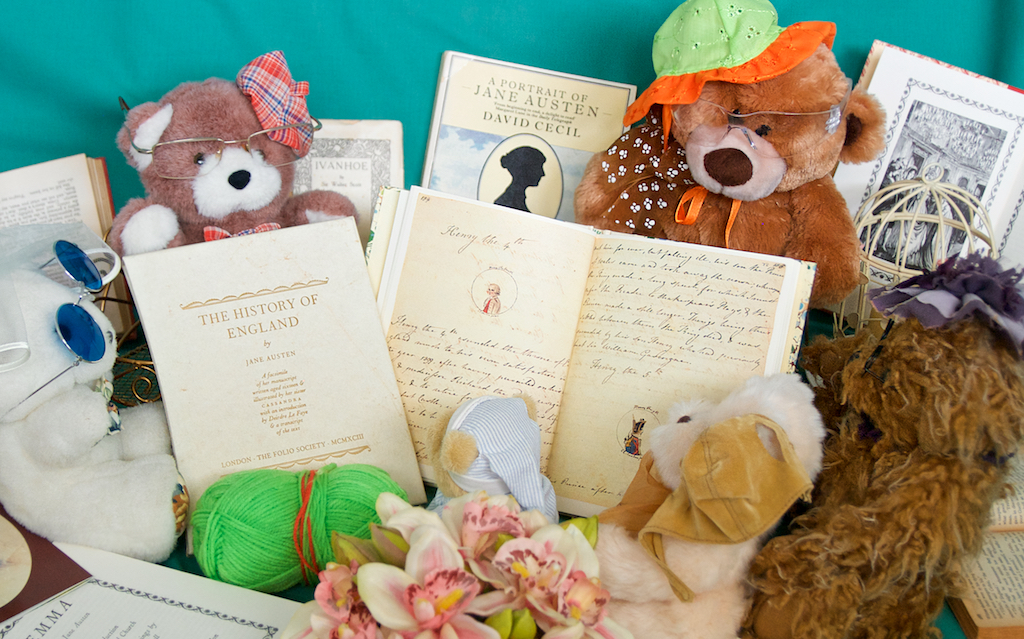 Several teddy bears, the Tedettes, read about Jane Austen