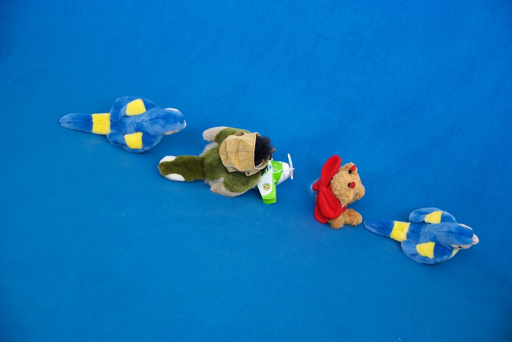 The birds and a Beeper bank down across the endless blue sky