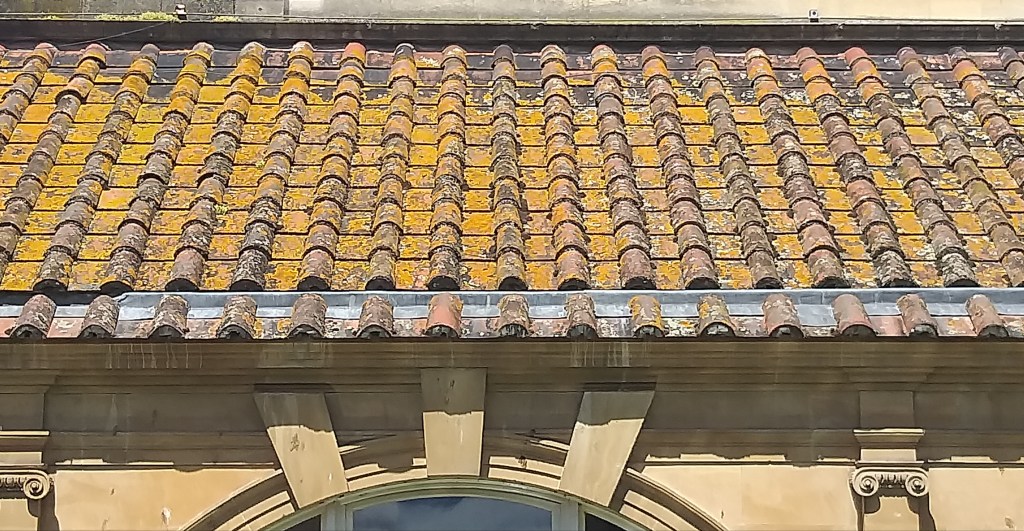 Roman tiles on the original bathhouse in Bath
