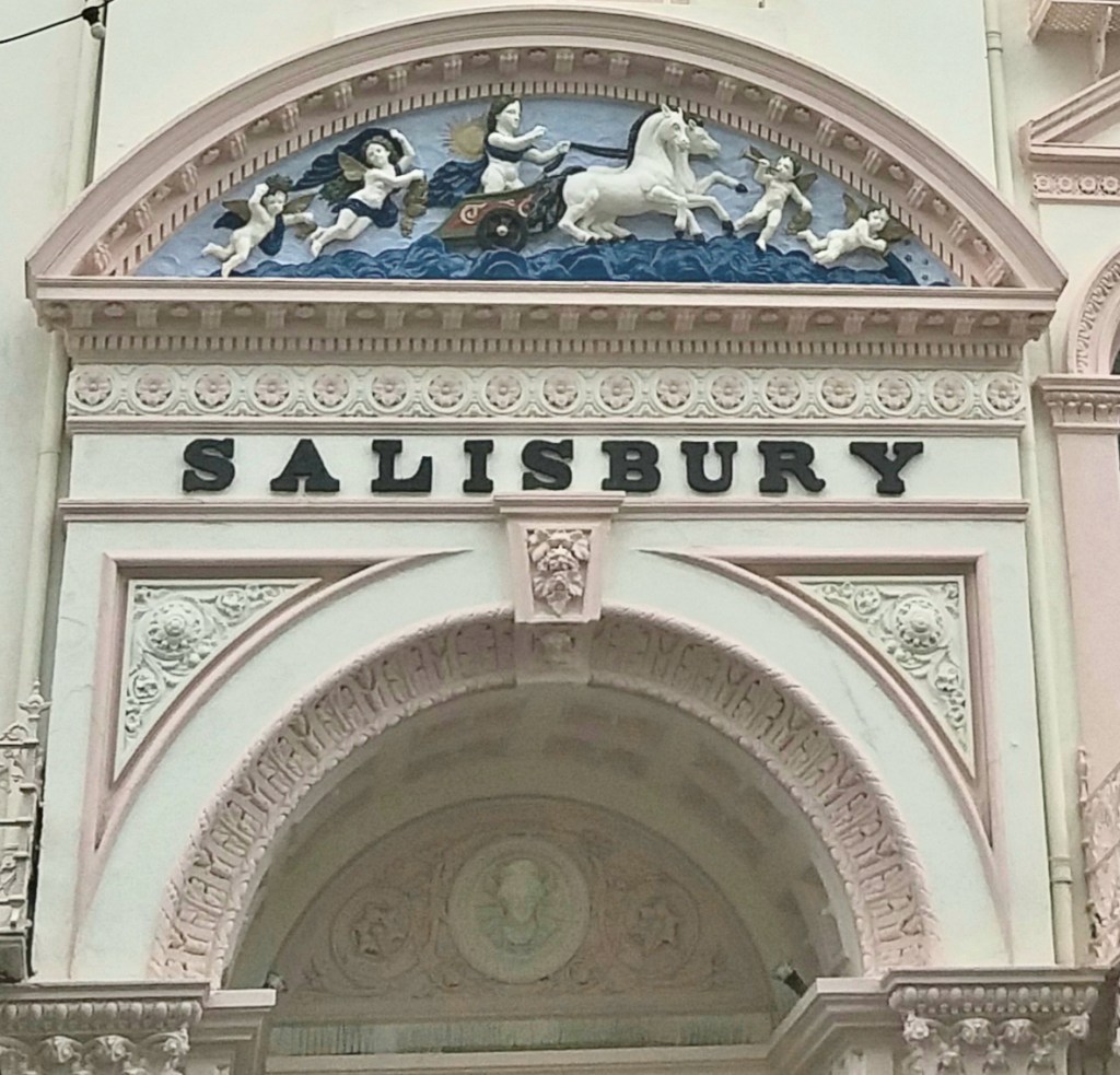 Decorations above a doorway on the Promendade